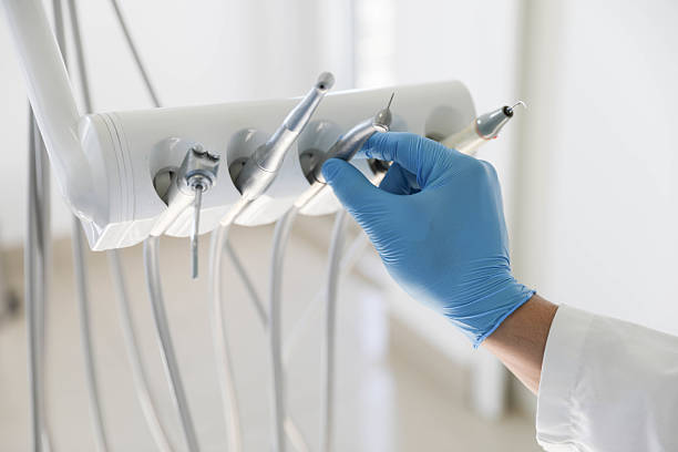 Professional Tooth Extraction technician working in Gosnell, AR